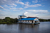  Catholic church on stilts in the water in the floating village on canal at Tonle Sap Lake, Chong Khnies, near Siem Reap, Siem Reap Province, Cambodia, Asia 