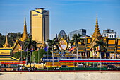  Stairs at the Tonle Sap River with Royal Palace and skyscrapers in the distance, Phnom Penh, Cambodia, Asia 