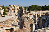 Ruins of the ancient city of Ephesus, a UNESCO World Heritage Site, with the Celsus Library in the background. Ephesus Archaeological Site, Turkey.