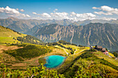  Mountain lake at Fellhorn with mountain panorama, summit panorama, panoramic path, mountain landscape, Alps, Oberallgäu, Bavaria, Germany\n 