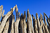  Wooden fence protecting Frans Indongo Lodge, Otjiwarongo, Otjozondjupa, Namibia, Africa 