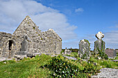 graveyard of the ruined complex of churches Na Seacht dTeampaill (the Seven Churches), Inishmore, the largest of the Aran Islands, Galway Bay, West Coast, Republic of Ireland, North-western Europe