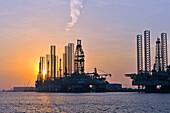 oil platform at sunset, Port of Galveston, Galveston island, Gulf of Mexico, Texas, United States of America, North America