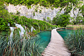  Wooden walkway, waterfall in Plitvice National Park, Croatia 