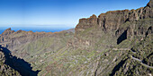  The mountain village of Masca surrounded by volcanic rock formations and the Masca Gorge, Barranco de Masca, Teno Mountains, Tenerife, Canary Islands, Spain, Europe 