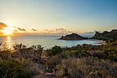  Lonely picturesque beach and red rocks, Spiaggia Su Sirboni, sunrise, near Tertenia, Ogliastra province, Sardinia, Italy 