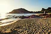  Lonely picturesque beach and red rocks, Spiaggia Su Sirboni, sunrise, near Tertenia, Ogliastra province, Sardinia, Italy 