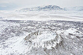  View of the Eldborg crater in the snow, Snaefellsnes, Iceland 