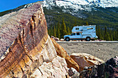  Pickup camper, rocks in the foreground, Jasper National Park, Alberta, Canada 