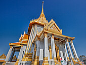 Exterior view of the Wat Traimit Temple on a bright sunny day. Bangkok, Thailand.