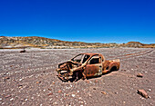  Vehicle wreck in the desert, Twyfelfontein, Kunene, Damaraland, Namibia, Africa 