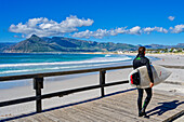  Surfers on the Atlantic beach Kommetjie, Cape Peninsula, South Africa, Africa 