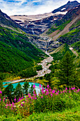 Beautiful Mountain Alp Grüm with Glacier and Alpine Lake Palü in a Cloudy Summer Day in Poschiavo, Bernina, Grisons, Switzerland.