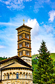 Beautiful Church San Carlo Borromeo with Bell Tower and with Mountain View in the Swiss Alps in a Sunny Summer Day in St Moritz, Maloja, Grisons, Switzerland.