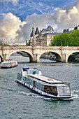 Riverboat, Pont Neuf and the Conciergerie, River Seine, France, Europe