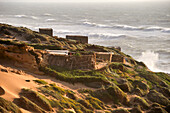 Fishermen's huts perched upon cliffs around Tamri on Atlantic Coast, between Agadir and Essaouira,Morocco,North Africa