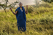  Portrait of a Maasai in the landscape, Tanzania, East Africa, Africa 