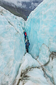 Mountaineers on glacier, Fox Glacier, Westland National Park, South Island, New Zealand