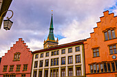 Town ​​hall and Theater and Church Tower in Old Town with Clouds in a Sunny Autumn Day in City of Biel, Bienne, Bern Canton, Switzerland.