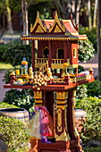  Colorful Buddhist altar with offerings outside a temple, Luang Prabang, Luang Prabang District, Luang Prabang, Laos, Asia 