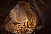  Miniature Buddha sculptures adorn the upper cave in the Pak Ou Caves, Pak Ou, Pak Ou District, Luang Prabang, Laos, Asia 