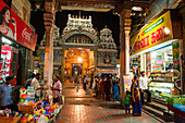 Tourist bazaar opposite the entrance hall on the East side of the Meenakshi Amman Temple, Madurai, Tamil Nadu state, South India, Asia