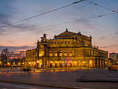  Festively illuminated Semperoper at sunset, Theaterplatz, Old Town, Dresden, Saxony, East Germany, Germany, Europe 