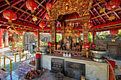 Interior of the pavilion enshrining Four Face Buddha image at Vihara Dharmayana, the 19th century Buddhist temple in Kuta, Bali, Indonesia.