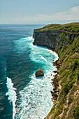 Elevated view of the iconic Uluwatu cliffs at Uluwatu Temple. Bukit peninsula, Bali, Indonesia.