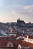 View of the Old Prague areas from the top in misty morning