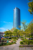  Jentower behind a well-kept park with footpath, blue sky, Jena, Thuringia, Germany 
