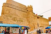  Kasbah (castle) and stalls selling souvenirs and handicrafts in the Medina in Hammamet, Tunisia 