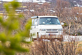  Motorhome in landscape, Dovrefjell-Sunndalsfjella National Park, Fylke Innlandet, Norway, Scandinavia 