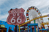 End of iconic Route 66 at Santa Monica Pier and carousel, Los Angeles, USA