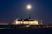  Ahlbeck pier in the evening with full moon, Usedom Island, Baltic Sea, Mecklenburg-Western Pomerania, Germany 