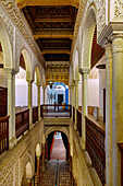  Open gallery with colonnade in the palace Dar Ennejma Ezzahra, Musical Instrument Museum (Centre des Musiques Arabes et Mediterraneenes), in the (Medina) old town of Sidi Bou Said, Tunisia 