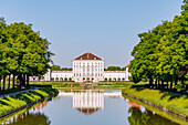  Nymphenburg Palace with Nymphenburg Canal in the morning light, Munich, Bavaria, Germany 