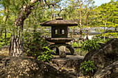 Japanese lantern in the Koko-En Garden; Japanese style garden next to the Himeji castle in Japan.