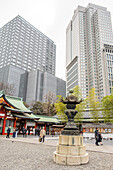 The Hie-jinja Shrine with mordern high rise buildings in the background, Nagatachō, Chiyoda, Tokyo, Japan.