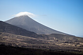  Clouds move over the top of a volcano near Puerto de la Cruz, Fuerteventura, Canary Islands, Spain, Europe 