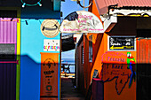 Cafe restaurant terrace on stilts, village of Deshaies, Basse-terre, Guadeloupe, overseas region of France,Leewards Islands, Lesser Antilles, Caribbean