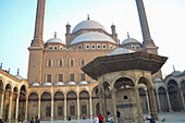 Visitors and prayers inside the courtyard of Muhammad Ali Mosque in Cairo's Citadel of Saladin, Egypt
