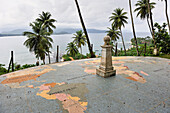 Mosaic with a mark at the intersection of the virtual Equator line and the Greenwich prime meridian on the small Rolas (turtledove) island in the south of Sao Tome Island, Republic of Sao Tome and Principe,Africa