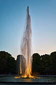  Illuminated fountain at dusk, Herrenhausen Garden, Hanover, Germany 