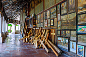  Open gallery of the Chapel of Grace with votive images and wooden crosses in Altötting, Upper Bavaria, Bavaria, Germany 