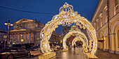 Brightly illuminated festive Christmas decorations in the historic center of Moscow, Russia.