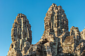  Panoramic image of giant stone-carved faces of Bodhisattva Lokeshvara, also known as Avalokiteshvara, Bayon Temple, Angkor Thom, UNESCO World Heritage Site, Angkor Wat, Siem Reap, Cambodia, Asia 