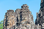  Panoramic image of giant stone-carved faces of Bodhisattva Lokeshvara, also known as Avalokiteshvara, Bayon Temple, Angkor Thom, UNESCO World Heritage Site, Angkor Wat, Siem Reap, Cambodia, Asia 