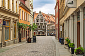  Alley in the old town and the Protestant Frauenkirche in Meissen, Saxony, Germany 