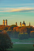  View from the Monopteros over the English Garden to the towers of the Frauenkirche and the towers and dome of the Theatinerkirche, Munich, Bavaria, Germany 